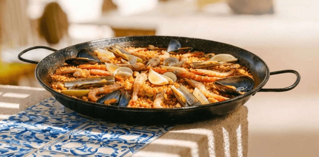 Seafood paella cooked over open fire at the Finca